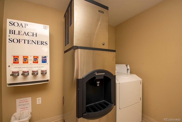 580 Winter Park Dr # 4571-4573, Winter Park, CO 80482 - laundry area with separate washer and dryer and baseboards