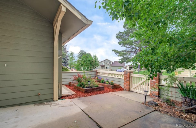 725 Crown Point Dr, Colorado Springs, CO 80906 - view of patio featuring a gate