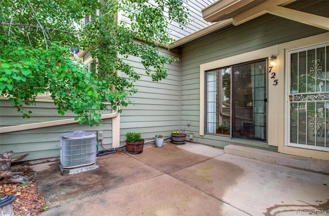 725 Crown Point Dr, Colorado Springs, CO 80906 - view of patio / terrace with central AC