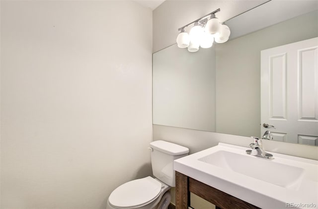 725 Crown Point Dr, Colorado Springs, CO 80906 - bathroom with toilet and vanity