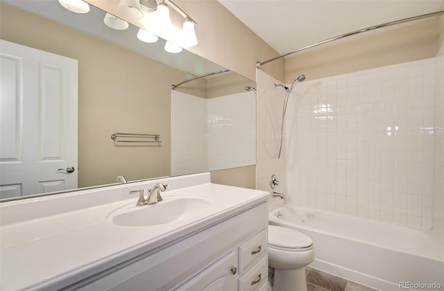 725 Crown Point Dr, Colorado Springs, CO 80906 - bathroom with vanity, bathing tub / shower combination, and toilet