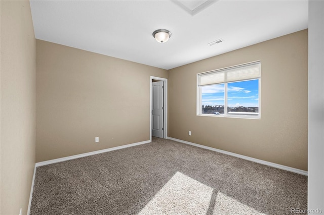 unfurnished room featuring carpet floors