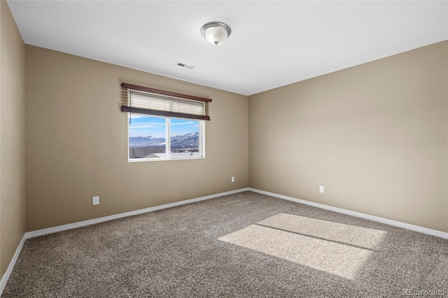 empty room with carpet floors