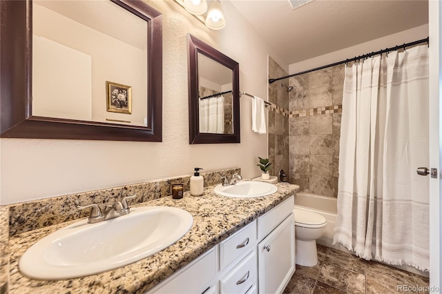 145 S Buchanan Ave, Louisville, CO 80027 - full bath featuring double vanity, toilet, and shower / bath combo with shower curtain