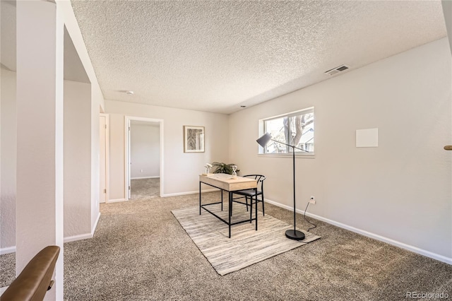 145 S Buchanan Ave, Louisville, CO 80027 - carpeted office featuring a textured ceiling and baseboards