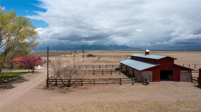 1374 N Rd 110, Mosca, CO 81146 - view of outbuilding featuring a rural view and an exterior structure