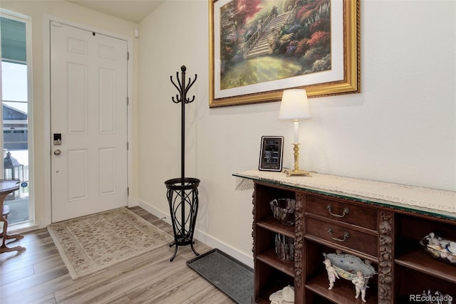 entryway with light hardwood / wood-style flooring