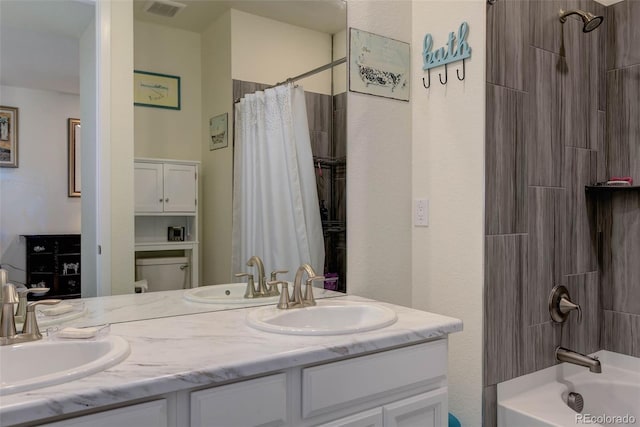 bathroom with vanity and shower / bath combination with curtain