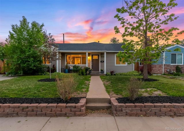 5125 Umatilla St, Denver, CO 80221 - single story home featuring a lawn