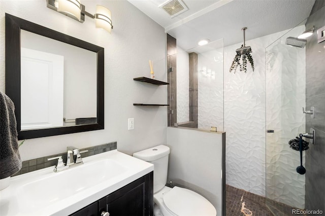 5125 Umatilla St, Denver, CO 80221 - bathroom with a walk in shower, vanity, and toilet