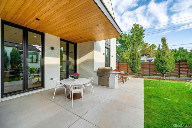 view of patio / terrace with a grill