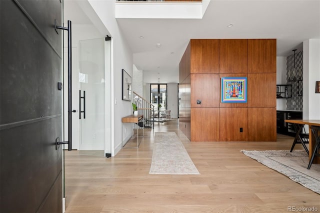 corridor featuring light hardwood / wood-style flooring