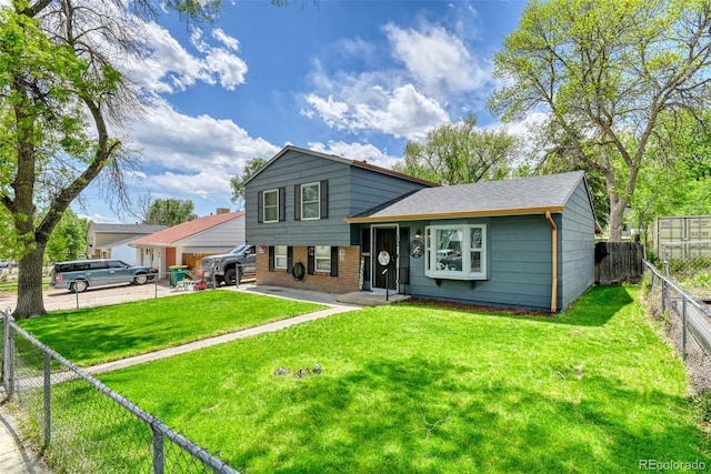 12 Arrawanna St, Colorado Springs, CO 80909 - view of front of home featuring brick siding and a shingled roof
