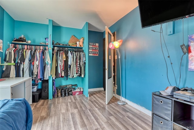 12 Arrawanna St, Colorado Springs, CO 80909 - bedroom with wood finished floors and baseboards
