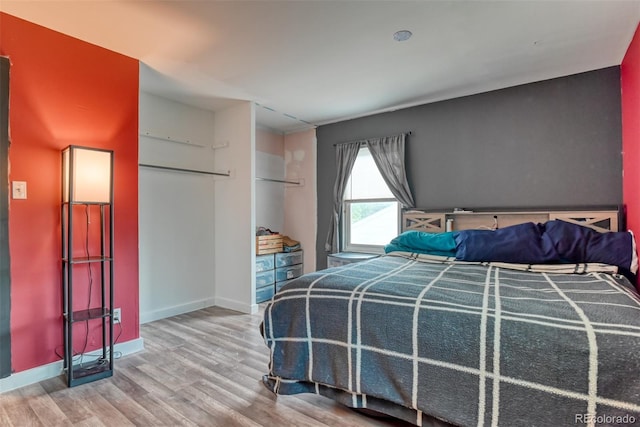12 Arrawanna St, Colorado Springs, CO 80909 - bedroom with wood finished floors and baseboards