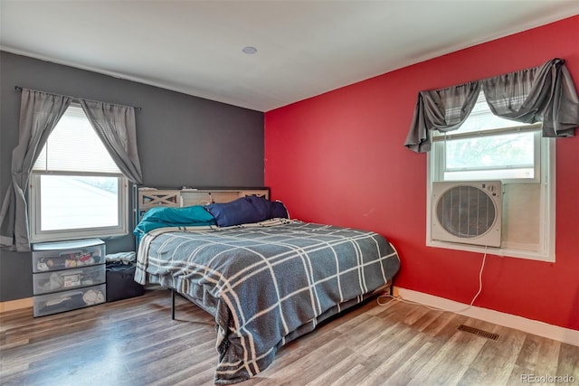 12 Arrawanna St, Colorado Springs, CO 80909 - bedroom featuring wood finished floors and baseboards