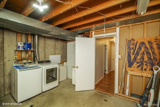 basement featuring separate washer and dryer