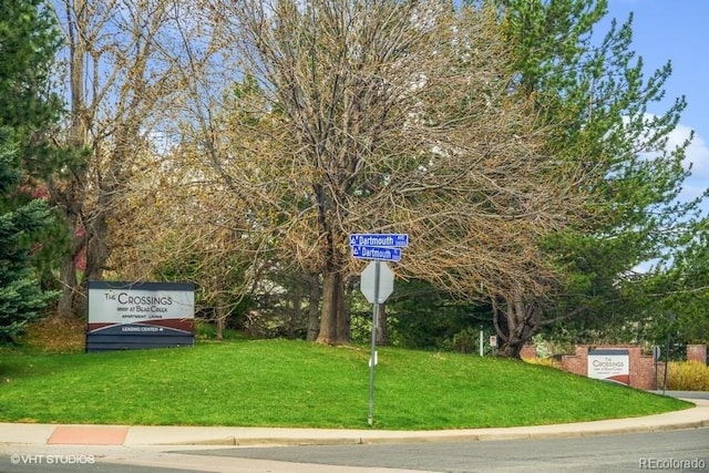 view of home's community featuring a yard