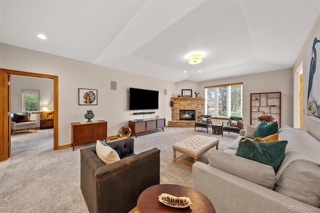 1999 Champions Cir, Castle Rock, CO 80104 - living room featuring light carpet, a stone fireplace, a tray ceiling, and recessed lighting