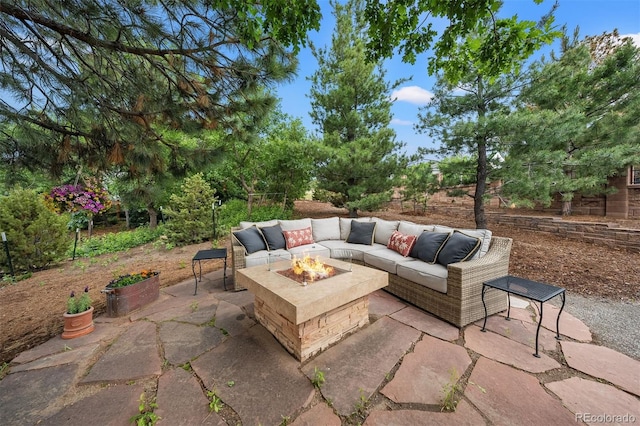 1999 Champions Cir, Castle Rock, CO 80104 - view of patio featuring an outdoor living space with a fire pit