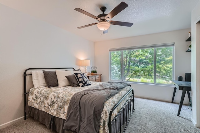 4875 S Balsam Way Unit 6-202, Littleton, CO 80123 - bedroom with carpet and ceiling fan