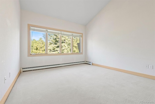 23655 Currant Dr, Golden, CO 80401 - carpeted spare room featuring a baseboard radiator, baseboards, and vaulted ceiling