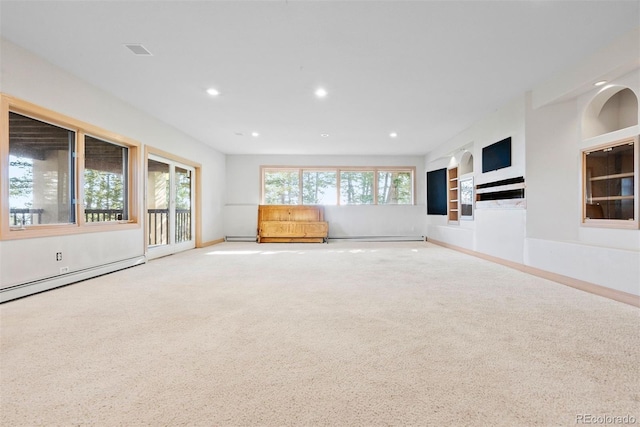 23655 Currant Dr, Golden, CO 80401 - spare room with carpet, baseboard heating, recessed lighting, baseboards, and built in shelves
