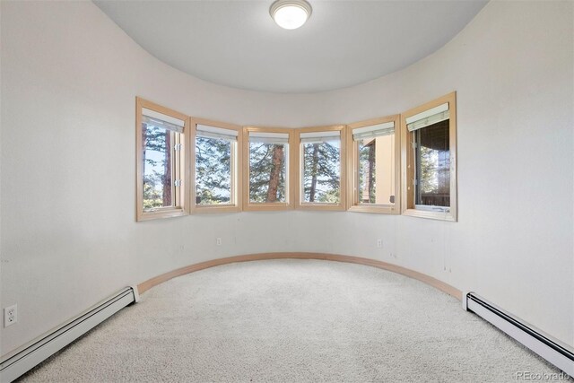 23655 Currant Dr, Golden, CO 80401 - carpeted spare room with a baseboard heating unit and baseboards