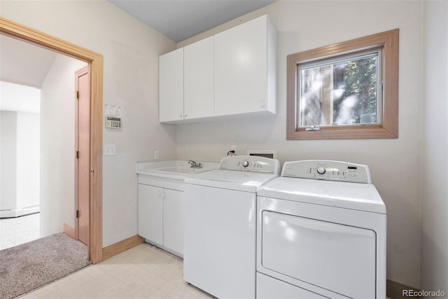 23655 Currant Dr, Golden, CO 80401 - laundry room with independent washer and dryer, cabinet space, light flooring, baseboards, and baseboard heating