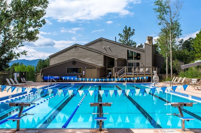 23655 Currant Dr, Golden, CO 80401 - community pool with a deck with mountain view and a patio area