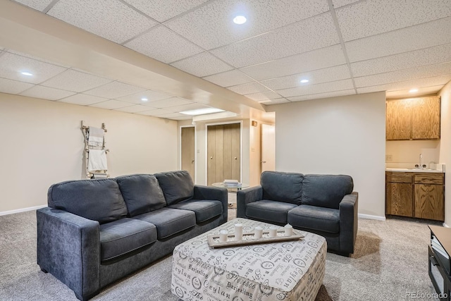 108 S Holman Way, Golden, CO 80401 - living area featuring light colored carpet, a drop ceiling, and recessed lighting
