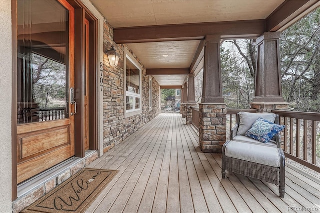 wooden deck featuring a porch