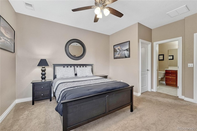 bedroom featuring light carpet, baseboards, and visible vents