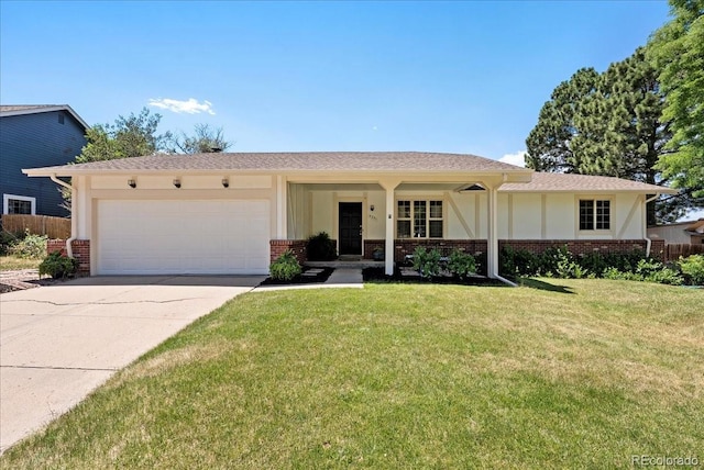 4351 S Evanston Ct, Aurora, CO 80015 - ranch-style home with brick siding, a garage, and driveway