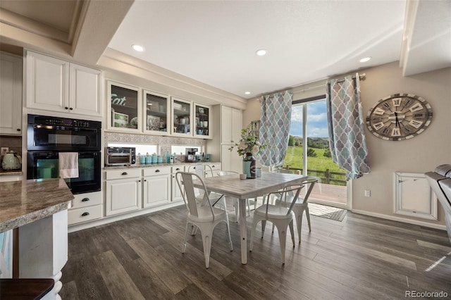 3871 Starry Night Loop, Castle Rock, CO 80109 - dining space with dark wood-style flooring and recessed lighting