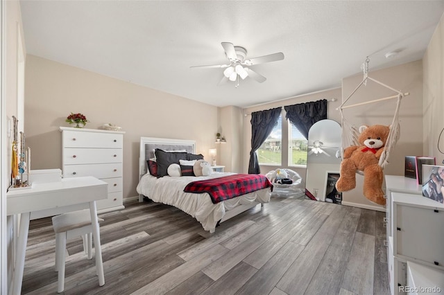 3871 Starry Night Loop, Castle Rock, CO 80109 - bedroom featuring wood finished floors and a ceiling fan