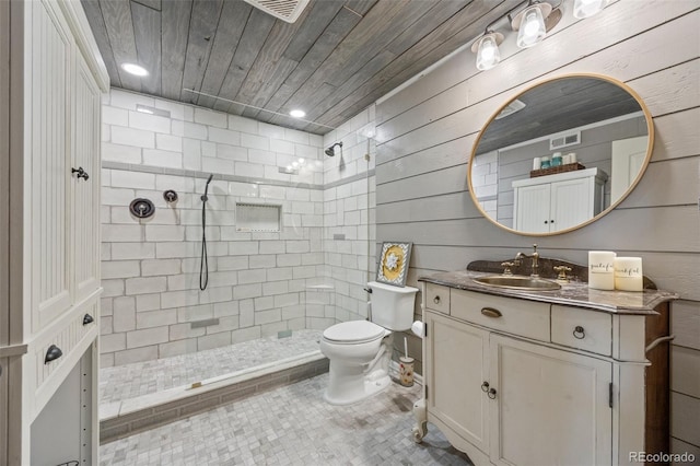 3871 Starry Night Loop, Castle Rock, CO 80109 - full bathroom featuring vanity, tiled shower, wooden ceiling, and tile patterned flooring