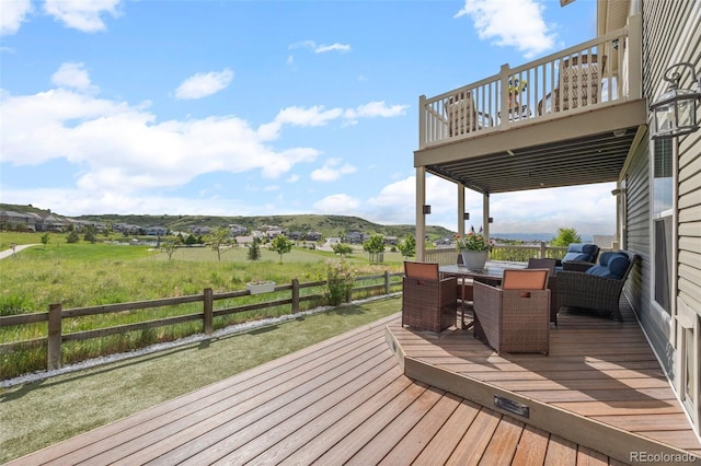 3871 Starry Night Loop, Castle Rock, CO 80109 - wooden deck with a fenced backyard and outdoor dining space