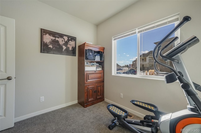 exercise room with carpet flooring