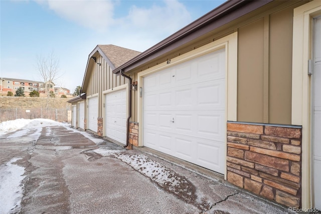 view of snow covered garage