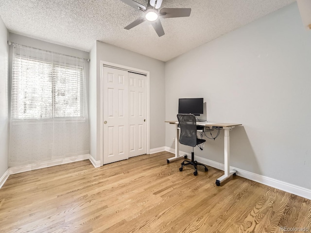 7826 S Niagara Way, Centennial, CO 80112 - office space with ceiling fan, light wood-style floors, and a textured ceiling