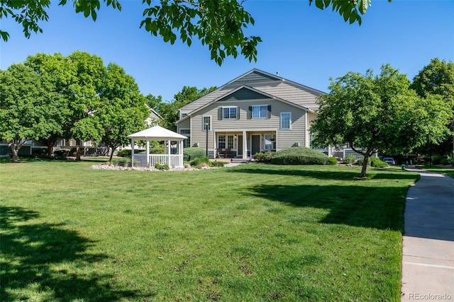 930 Button Rock Dr Unit 28, Longmont, CO 80504 - view of front facade with a gazebo and a front yard