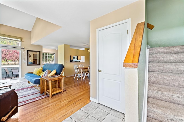 930 Button Rock Dr Unit 28, Longmont, CO 80504 - staircase with baseboards and wood finished floors