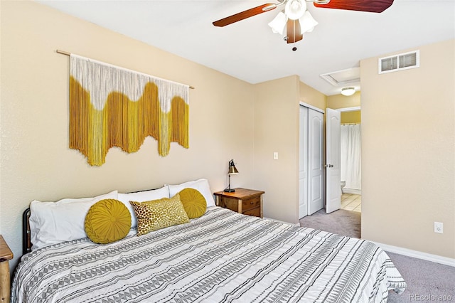 930 Button Rock Dr Unit 28, Longmont, CO 80504 - carpeted bedroom with attic access, a closet, a ceiling fan, baseboards, and connected bathroom