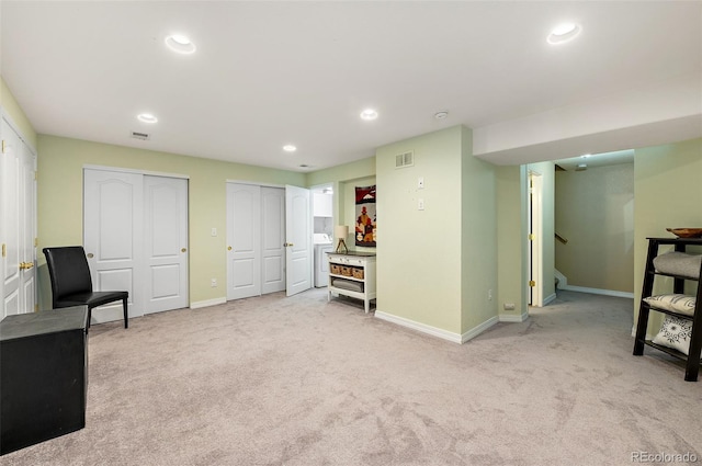 930 Button Rock Dr Unit 28, Longmont, CO 80504 - sitting room featuring washer / dryer, baseboards, light carpet, and recessed lighting