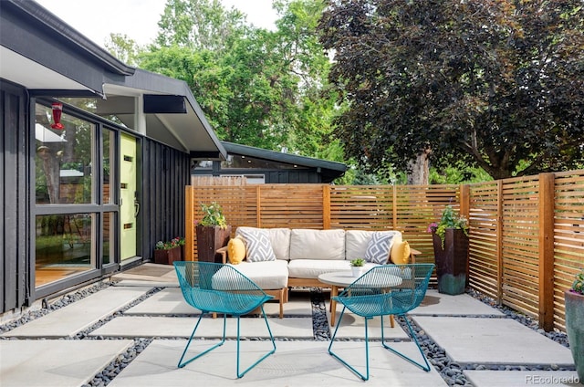 2525 S Meade St, Denver, CO 80219 - fenced backyard with a patio area and outdoor lounge area