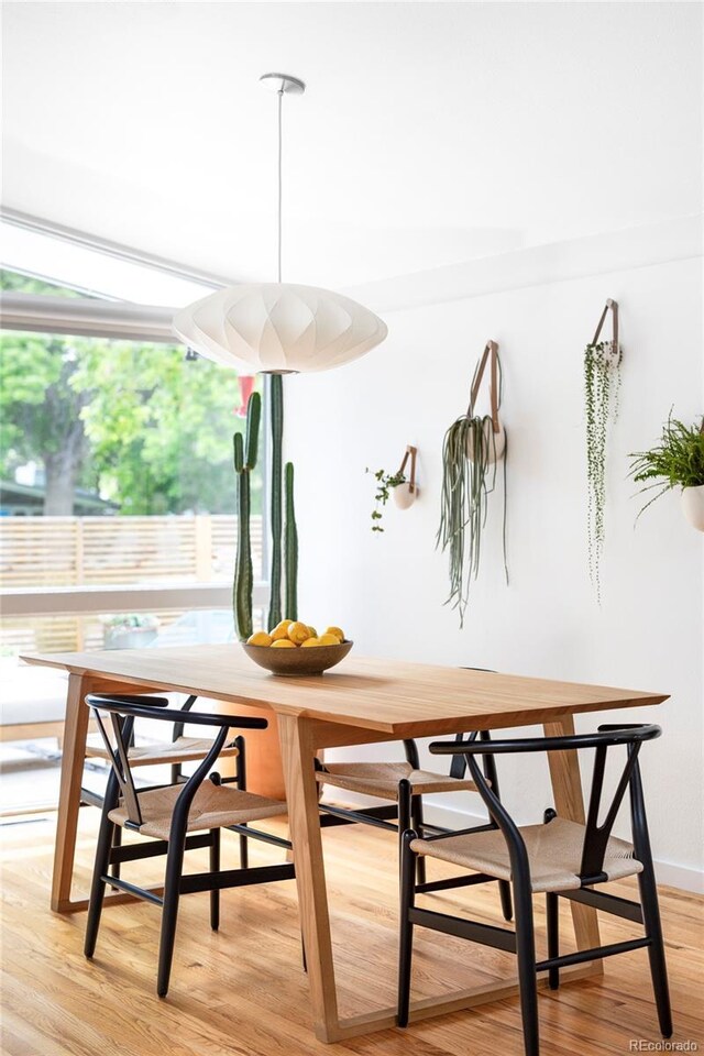 2525 S Meade St, Denver, CO 80219 - dining space featuring light wood-type flooring