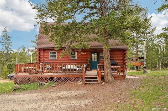 143 Juniper Rd, Black Hawk, CO 80422 - back of house featuring log siding, a shingled roof, and a wooden deck