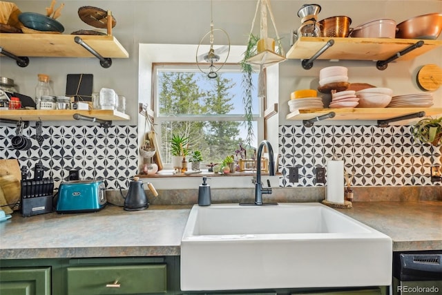 143 Juniper Rd, Black Hawk, CO 80422 - kitchen featuring open shelves, a sink, green cabinetry, and decorative backsplash