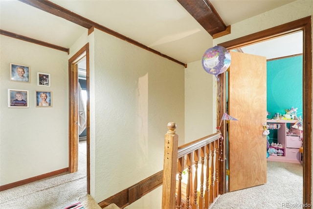 143 Juniper Rd, Black Hawk, CO 80422 - hallway featuring carpet flooring, an upstairs landing, and beam ceiling